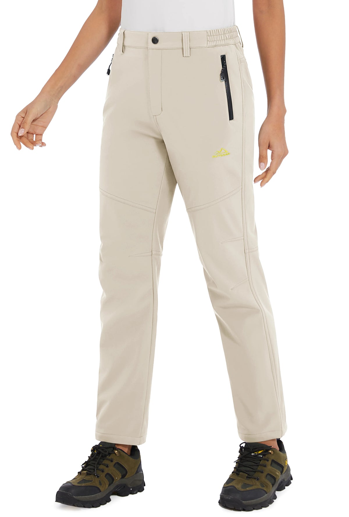 White women's winter waterproof pants by TACVASEN, designed for outdoor activities and cold weather protection.
