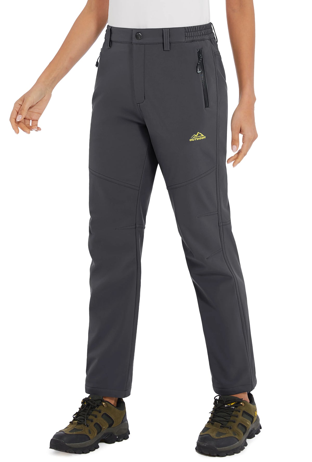 White women's waterproof winter pants by Tacvasen, featuring a snug fit and durable waterproof fabric for outdoor activities.