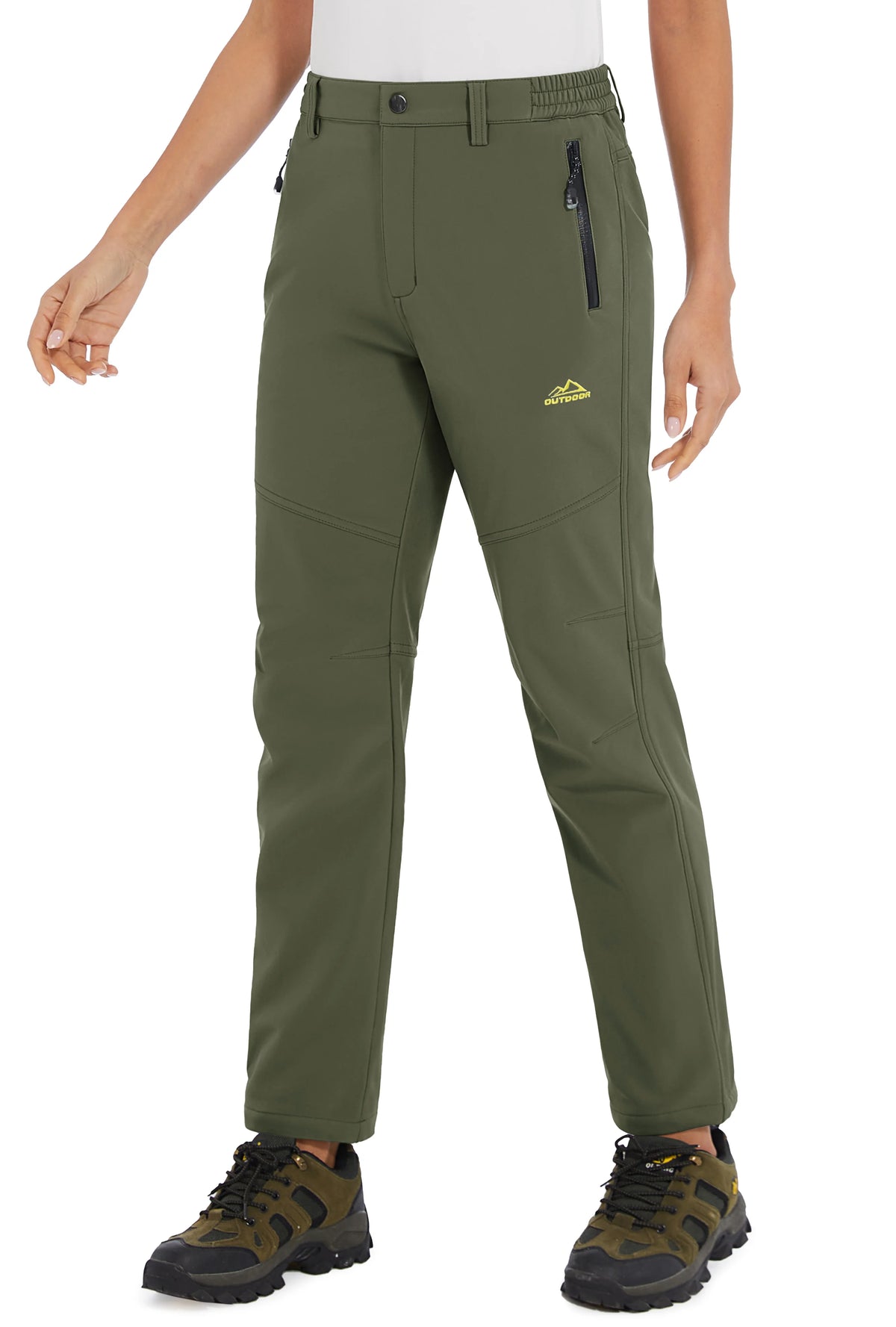 White women's winter waterproof pants by Tacvasen, designed for outdoor activities, showing the full length of the insulated, waterproof pants.