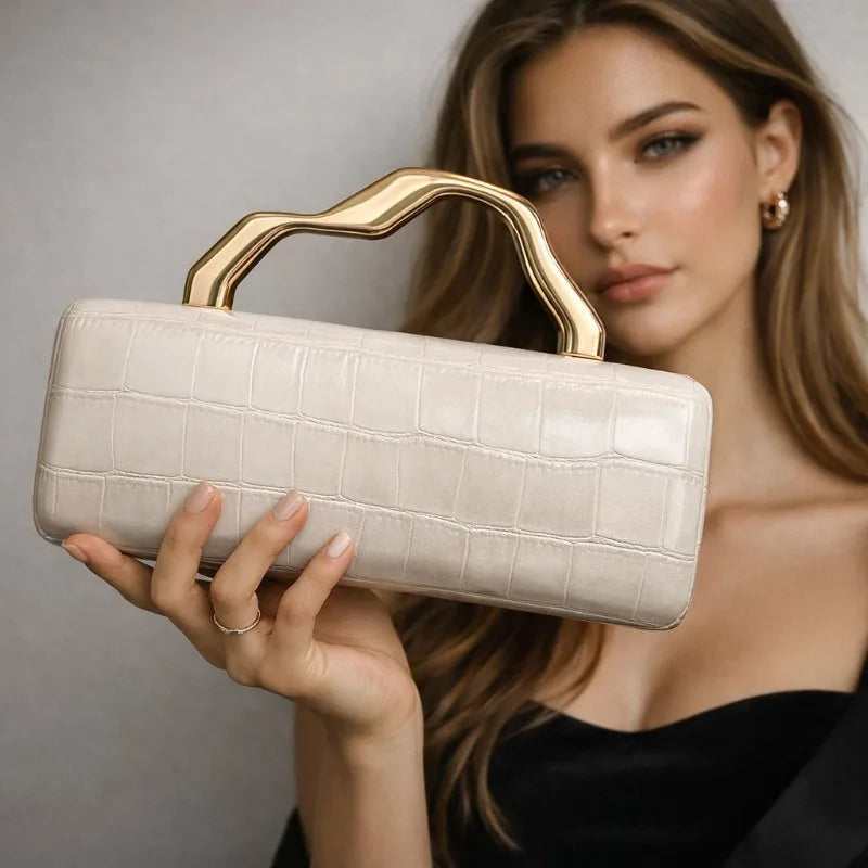 White PU crossbody bag for women with shoulder strap, stylish and compact, from Corporación Turística.