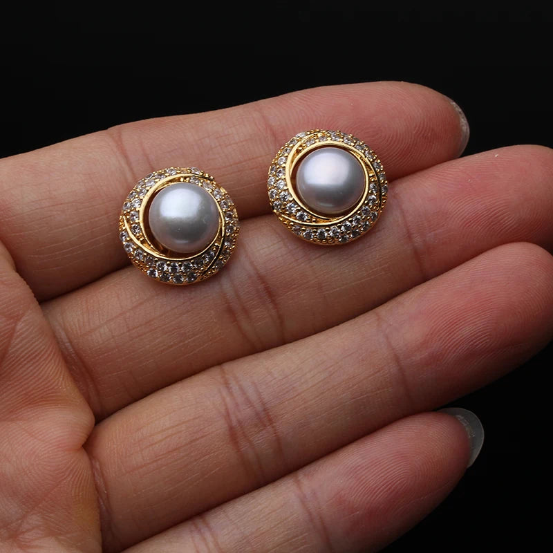 Natural water droplet pearl earrings for women, featuring elegant white freshwater pearls by Corporación Turística.