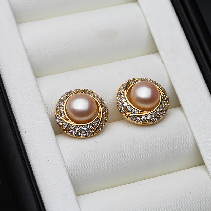 Elegant white freshwater pearl earrings for women, featuring natural water pearl pendants from Corporación Turística.