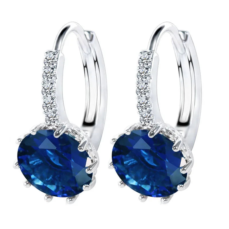 Silver 925 authentic hoop earrings for women, showcasing shiny round hoops with a polished finish.