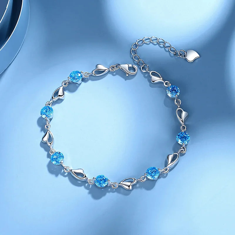 Luxury S925 sterling silver love bracelet with crystal accents, elegant jewelry piece featuring a romantic design.