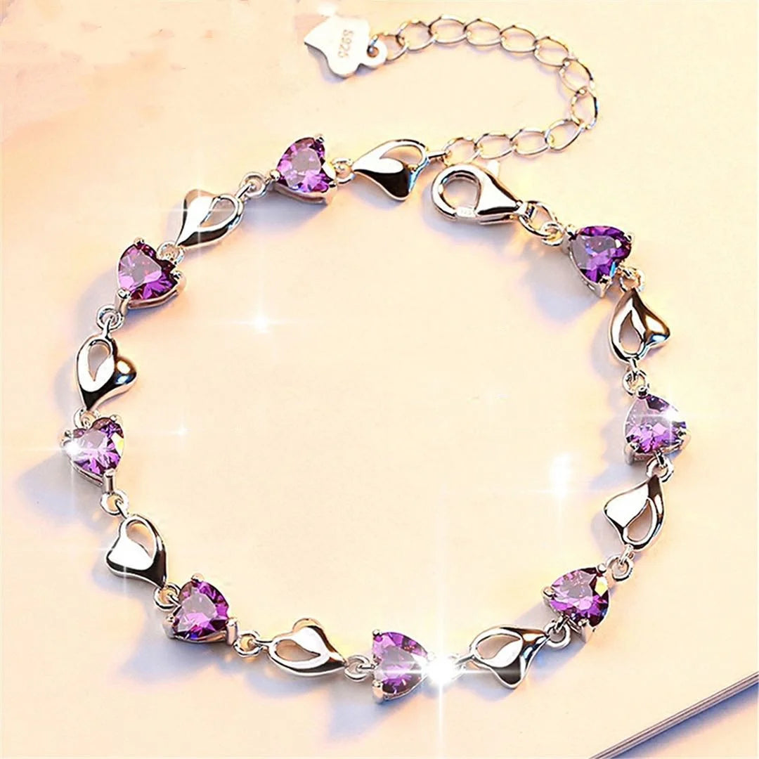 Luxury S925 silver love bracelet with crystal from Corporación Turística, featuring a delicate design and shiny finish.