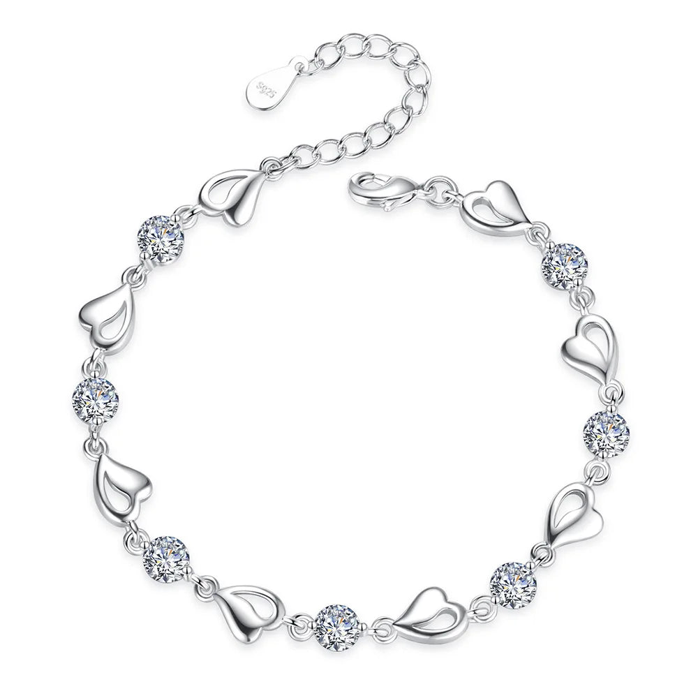 Luxury S925 sterling silver love bracelet with crystal accents, elegant jewelry piece from Corporación Turística.