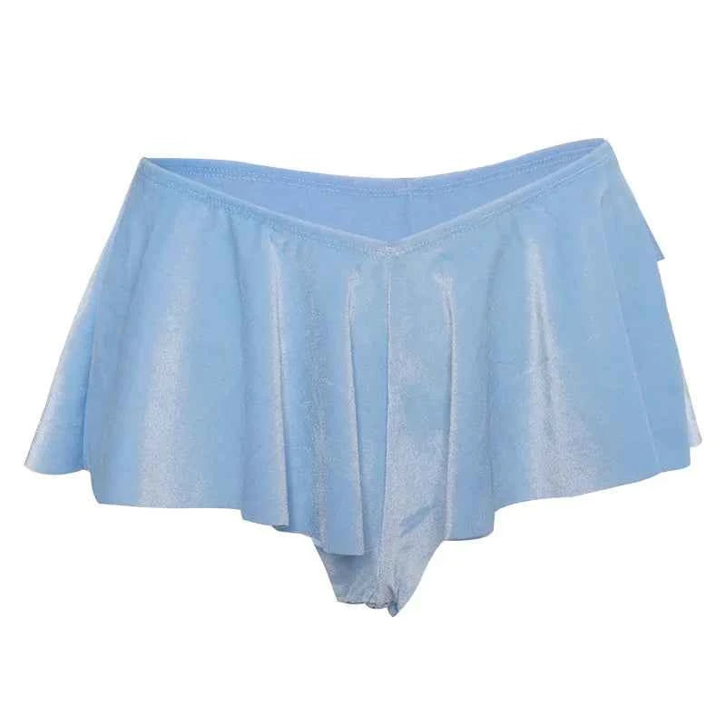 White low-rise relaxed fit women's shorts by Corporación Turística, styled with a loose waistband and comfortable fit.