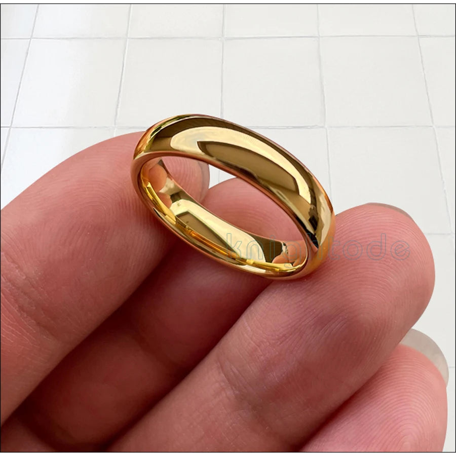 Cluster of classic wedding rings from Corporación Turística in 3mm, 5mm, and 7mm widths, shiny gold finish, and smooth design.