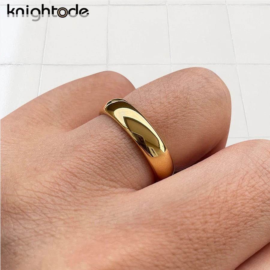 Classic wedding rings by Corporación Turística in 3mm, 5mm, and 7mm widths, displayed in a close-up image.