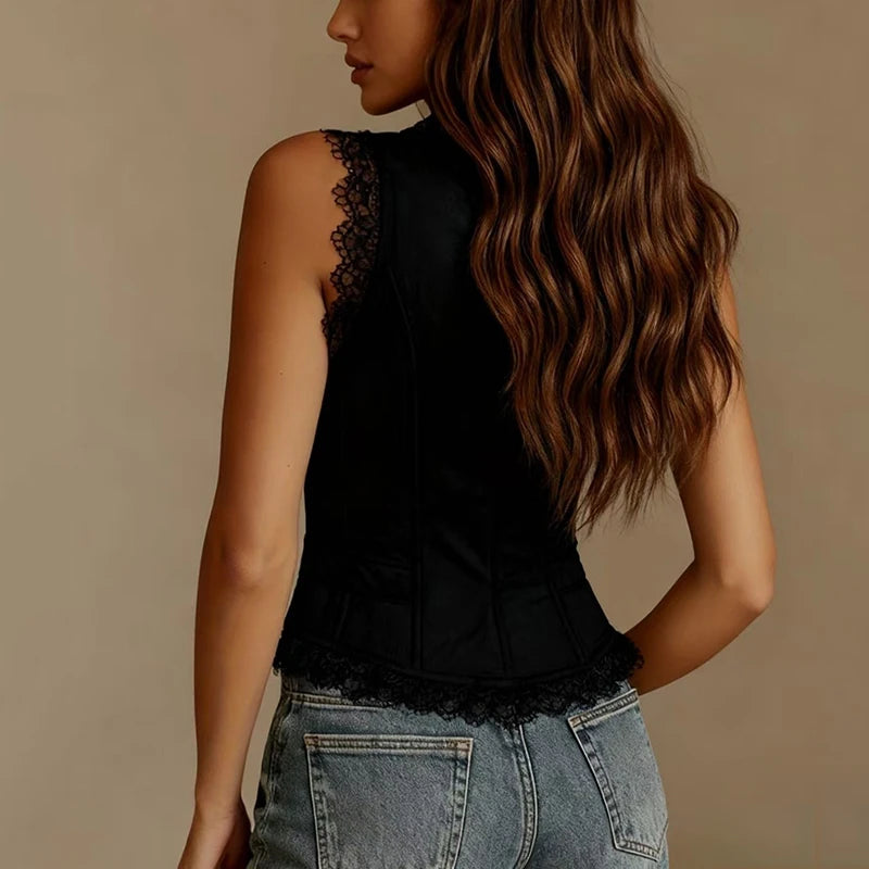 White sleeveless vest with deep V-neckline and buttons, by Corporación Turística, shown on a mannequin.
