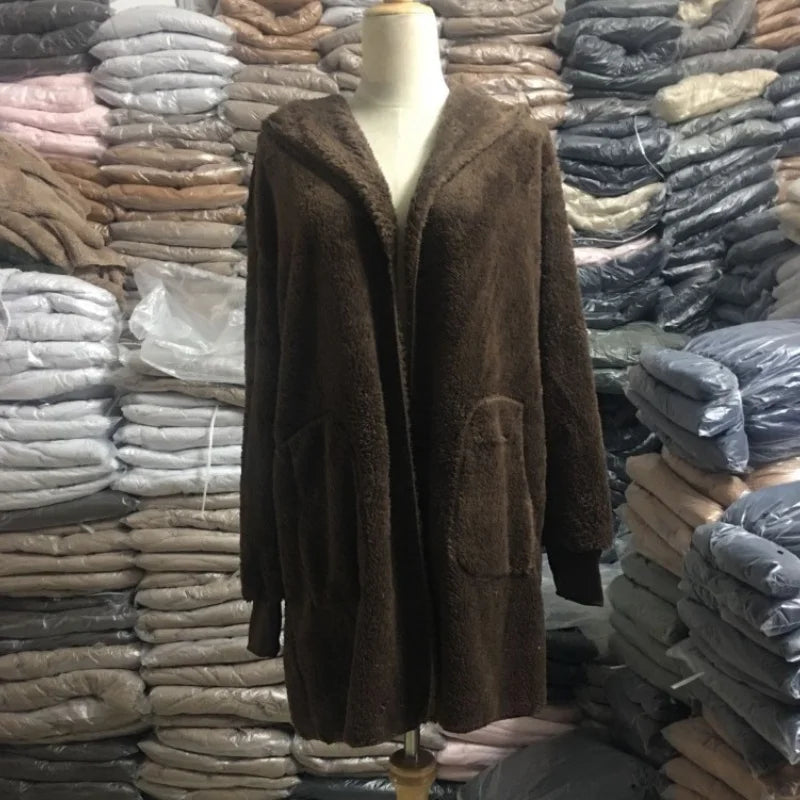 Long pink wool cardigan from Corporación Turística with 12-color options, perfect for autumn, featuring cozy, long-sleeve design.