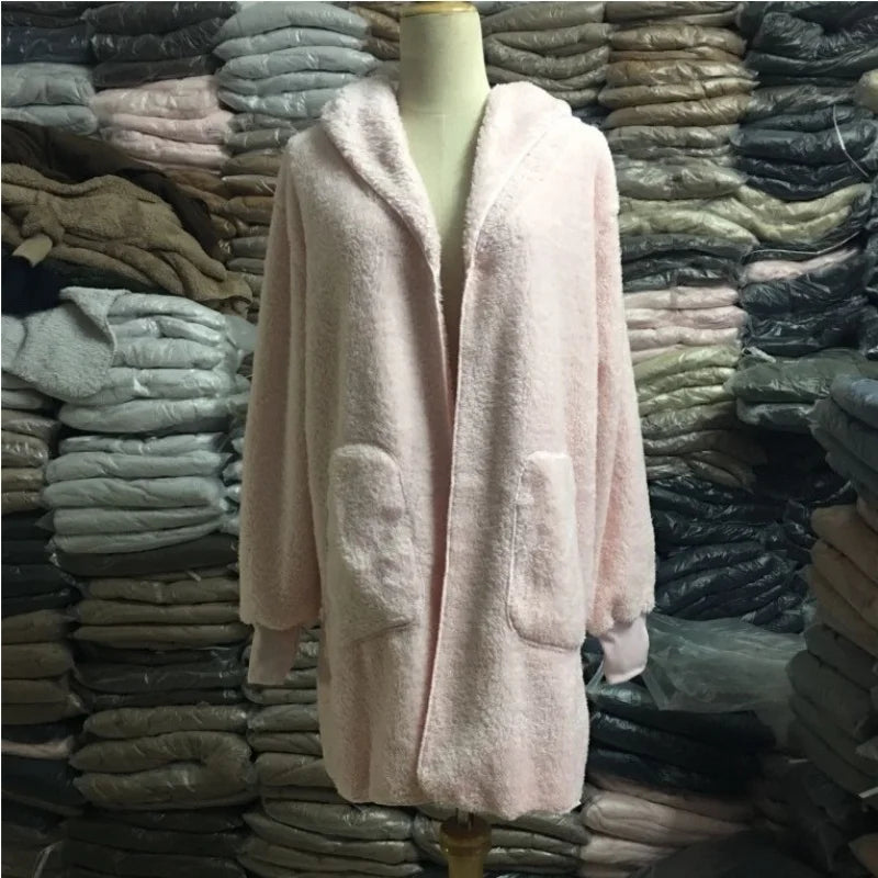 Pink 12-color wool sweater from Corporación Turística, long cardigan style, perfect for fall and layered looks.
