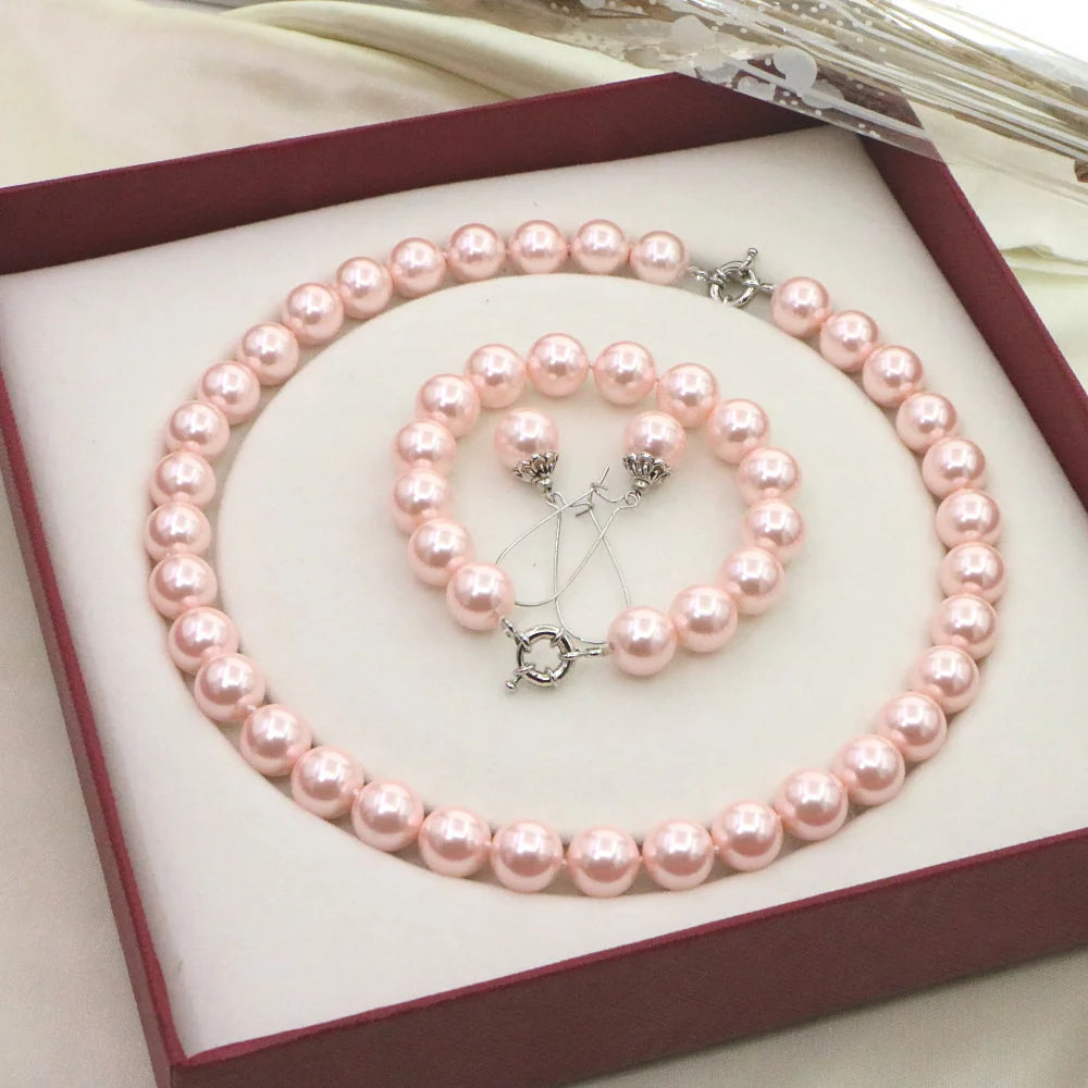 Set of necklace and bracelet with round cone-shaped beads from Corporación Turística, featuring colorful, handcrafted jewelry.