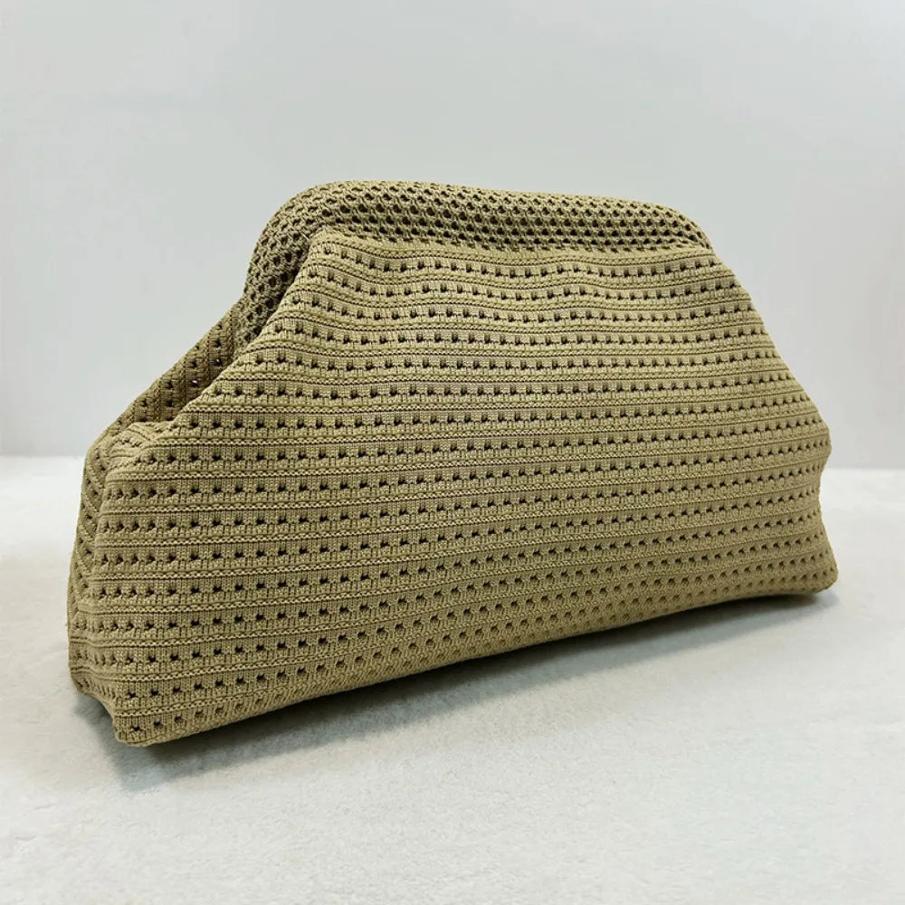 Yellow women's beach clutch bag with a smooth, solid color design, perfect for carrying essentials during seaside outings.