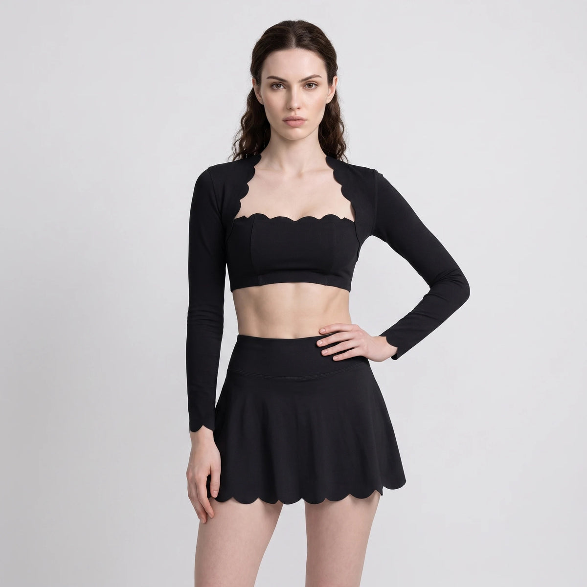 Yellow women's sports set from Corporación Turística's Serie Scallop Petal, includes sports top and leggings for active wear.