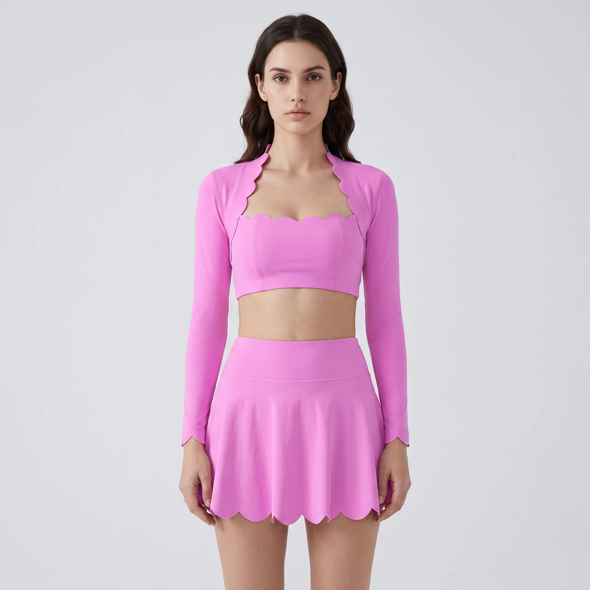 Yellow women's sports set from Corporación Turística, Series Scallop Petal, including sports top and matching bottoms.