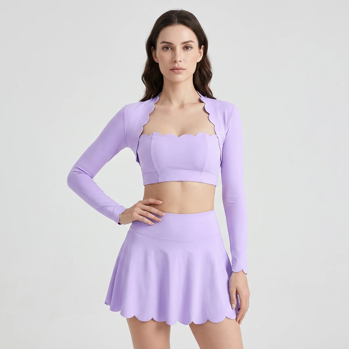Yellow women's sports set from Corporación Turística, Series Scallop Petal, includes sports top and leggings.