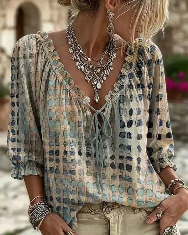 Bohemia summer women's blouse with loose fit, floral print, and V-neck from Corporación Turística, suitable for warm weather.