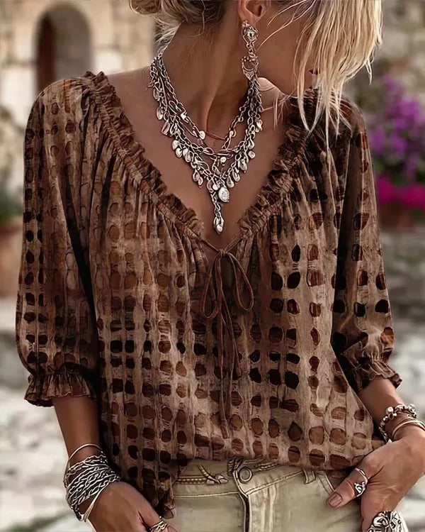 Bohemia-style summer blouse for women with loose fit, floral print, and V-neck, by Corporación Turística.