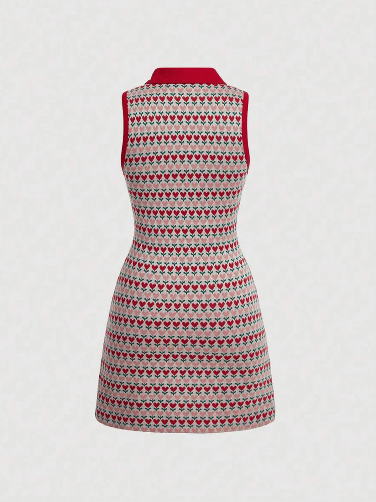 Elegant sleeveless knit dress with lapel collar from Corporación Turística, shown in a stylish, close-up view.