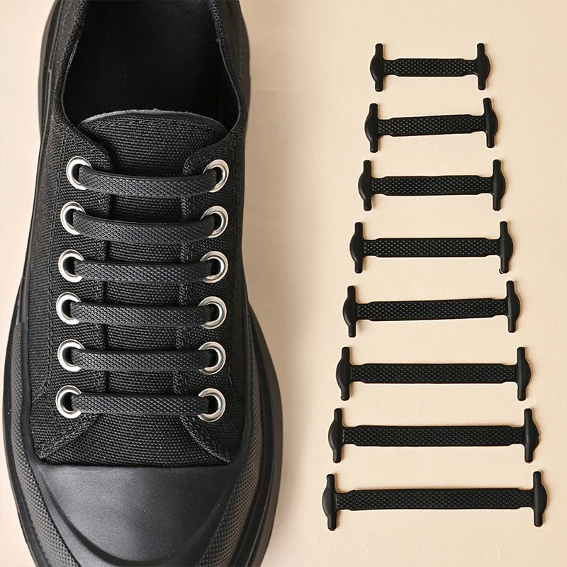 Black silicone shoelaces by COSYLEE, 16 pairs of elastic, no-tie cordones for sneakers or casual footwear, 7 cm length.