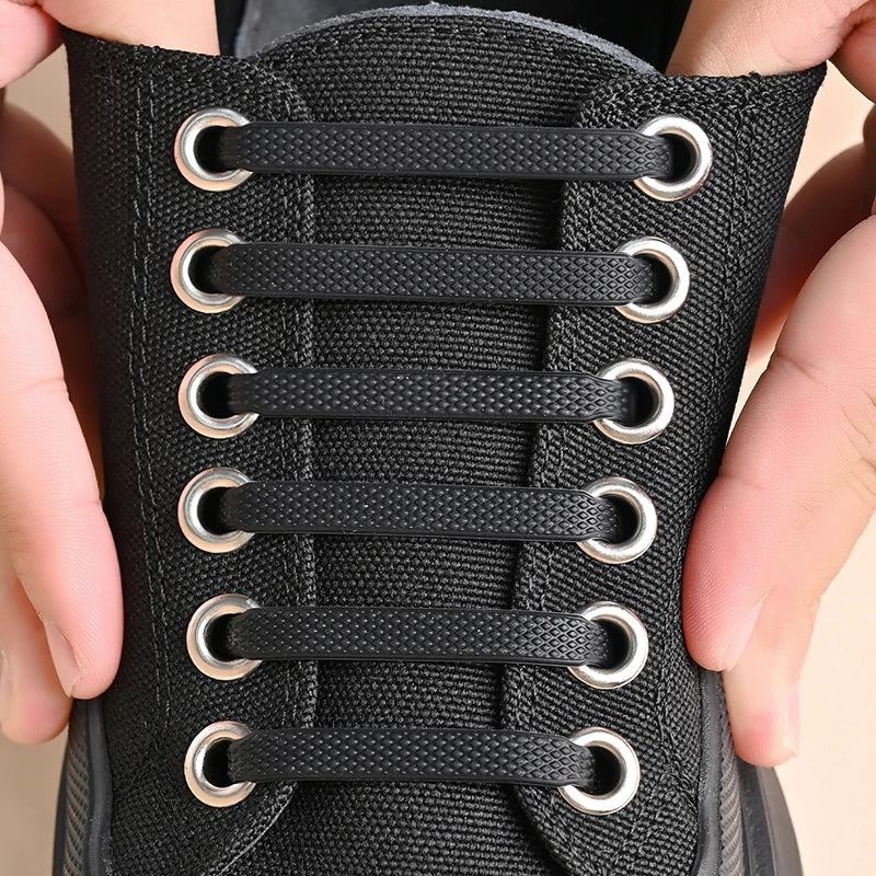 Black silicone shoe laces by COSYLEE, 7 cm elastic no-tie cordons, 16 pairs, suitable for casual and athletic footwear.