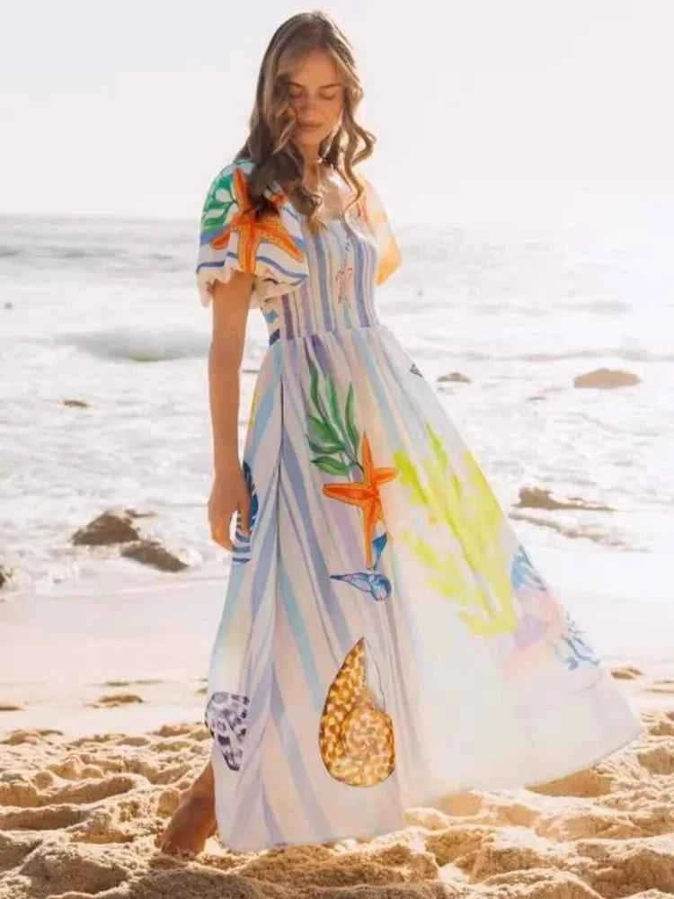Fansumgo maxi beach dress with colorful mixed print, flowing bata style, perfect for summer beachwear.