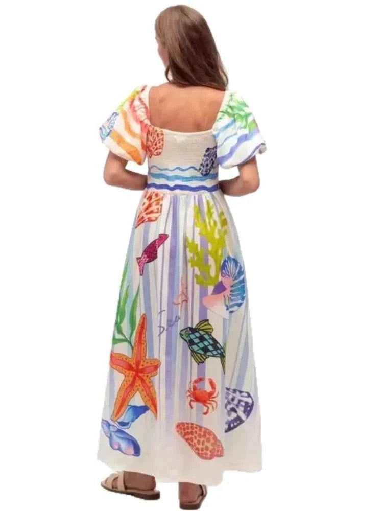 Fansumgo maxi beach dress with colorful printed fabric, relaxed bata style, perfect for summer beachwear, in size XL.