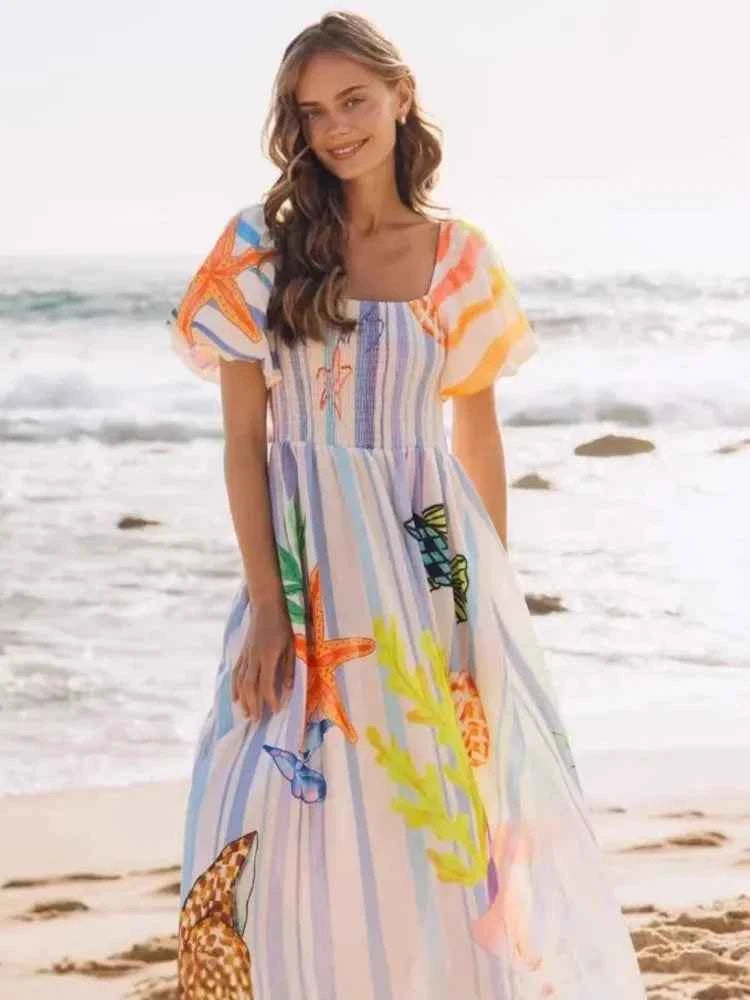 Fansumgo maxi beach dress with colorful mixed print, flowing style, and bata-inspired design, perfect for summer beachwear.