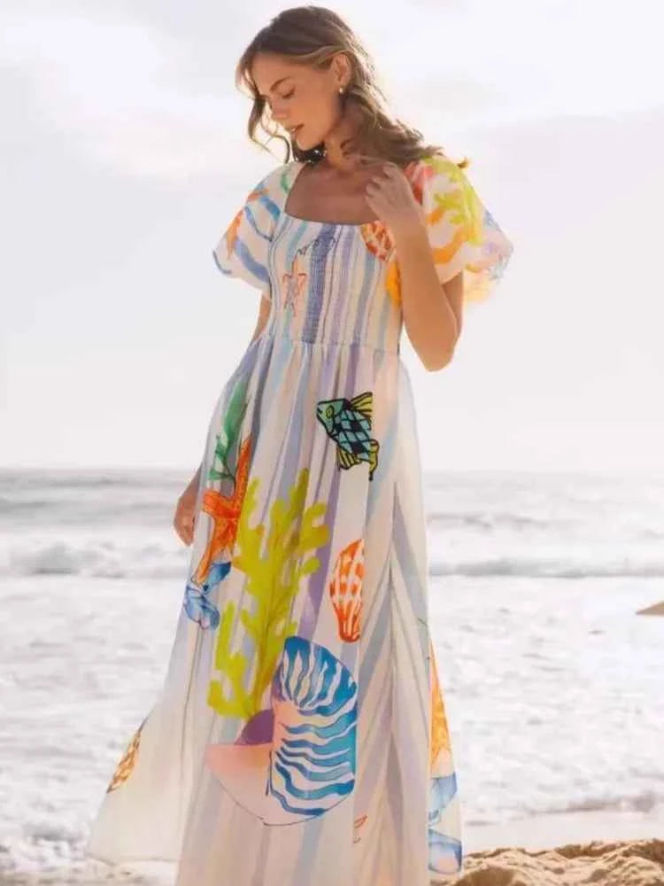 Fansumgo maxi beach dress with colorful mixed print, relaxed bata style, perfect for summer beachwear.