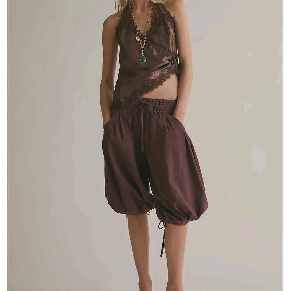 Elegant satin camisole with lace accents from FYBITBO, sleeveless Y2K style top for women, perfect for summer wear.