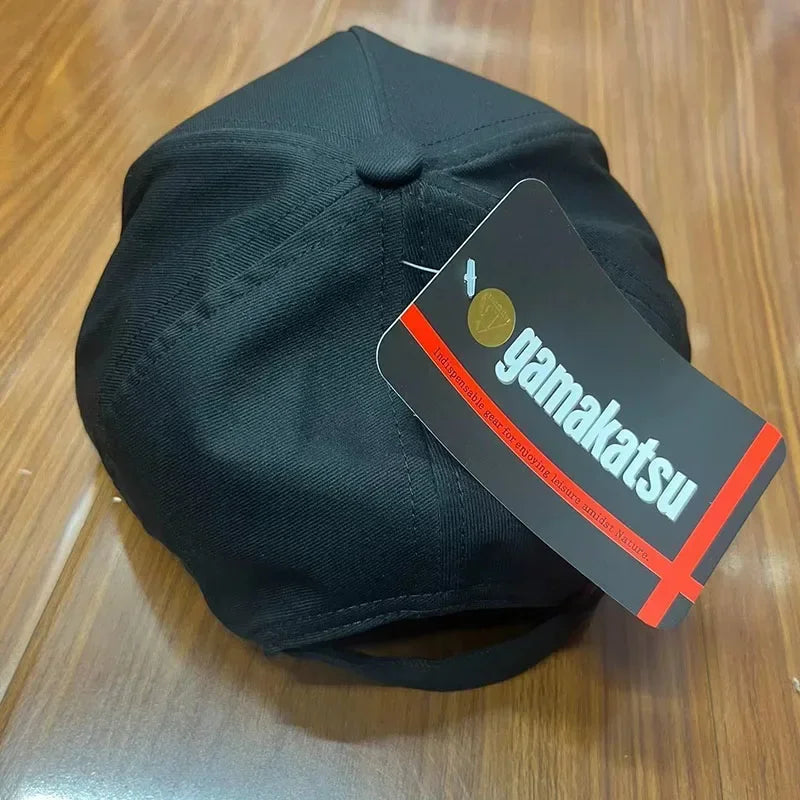 Gamakatsu waterproof breathable cotton fishing cap, summer accessory with wide brim and adjustable strap for outdoor fishing.