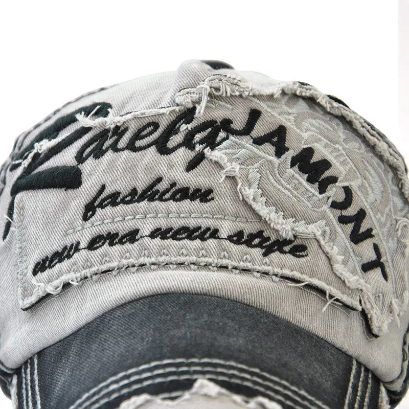 Unisex blue cotton baseball cap with embroidered design, adjustable fit, from JAMONT, in the accessories category.