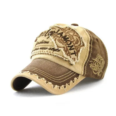 Unisex blue cotton baseball cap by JAMONT with embroidered design, adjustable strap, suitable as a stylish accessory.
