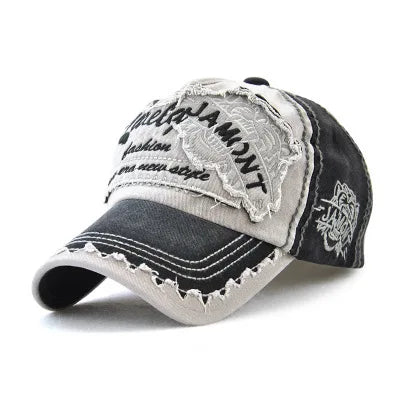 Unisex blue cotton baseball cap by JAMONT with embroidered design, adjustable strap, and classic six-panel style.