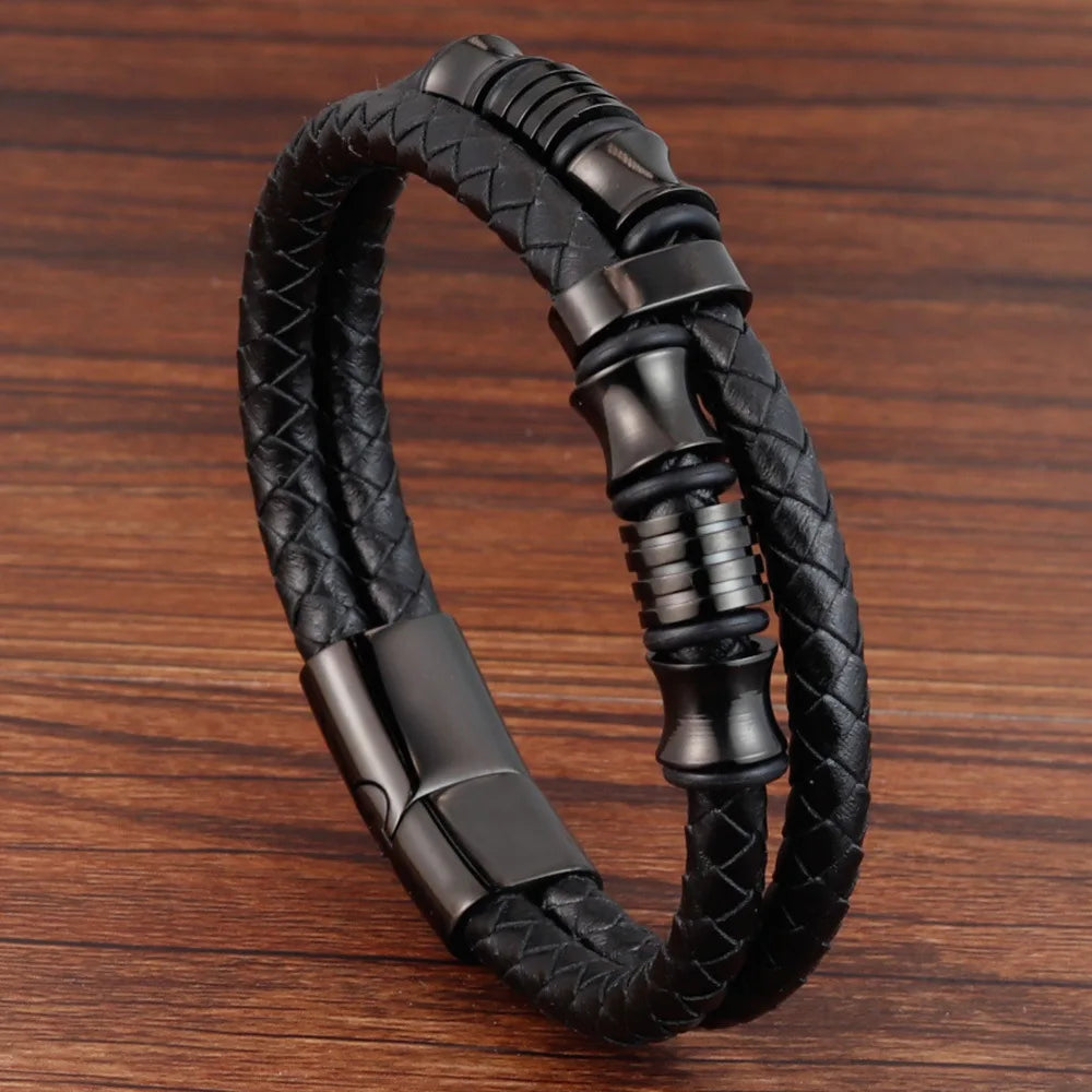 Trenzada de cuero y acero magnético pulsera para hombre de la marca JIAYUPENG, en color oscuro y tamaño 21-22 cm.