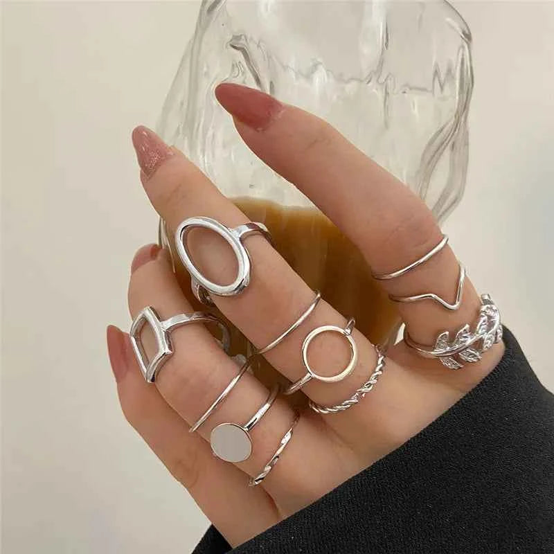 Bohemian-style Modyle 18K gold ring set with circon stones, featuring multiple stacked rings for women's jewelry or wedding gift.