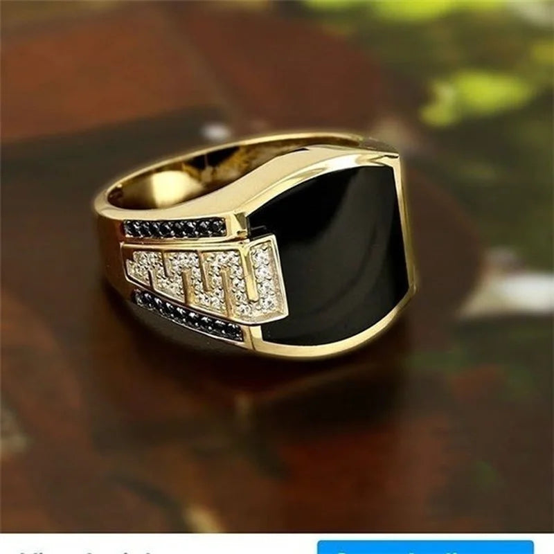 Gold men's punk ring with black stone and cubic zirconia, ideal for wedding or engagement jewelry.