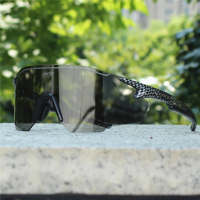NRC UV400 TR90 sports cycling sunglasses with black frame and tinted lenses, suitable for MTB, fishing, and hiking activities.