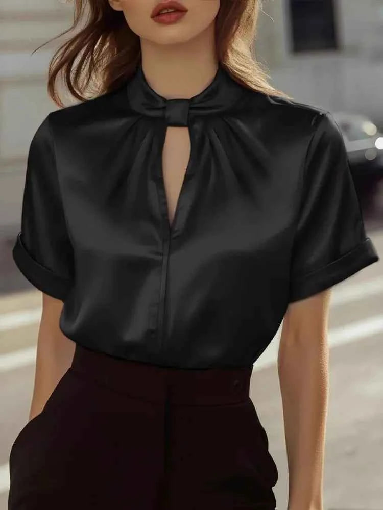 Black short-sleeve elegant blouse for women from Potskie, ideal for office casual wear, stylish and comfortable.