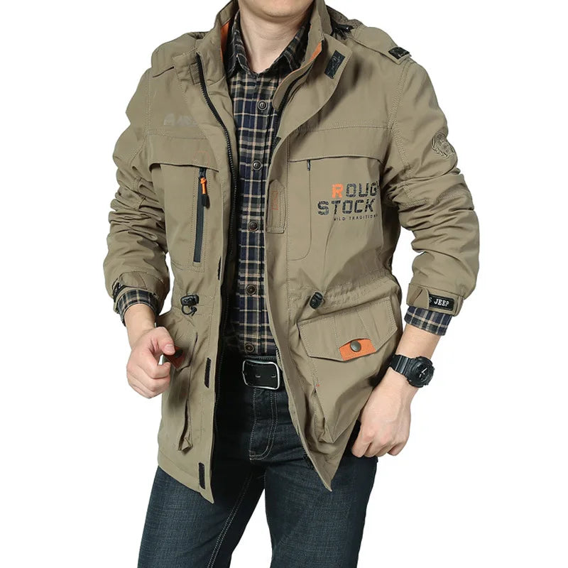 Rindu men's windproof tactical waterproof jacket with hood, caqui color, suitable for hiking and outdoor activities.