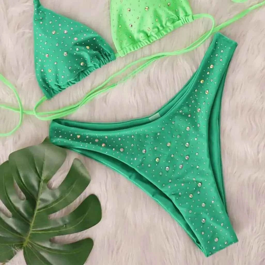 Elegant green bikini halter swimsuit by Varleinsar, stylish women's beachwear perfect for making a statement at the beach.